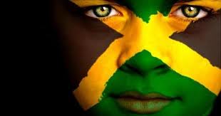Лицо ребенка, раскрашенное в цвета флага Ямайки